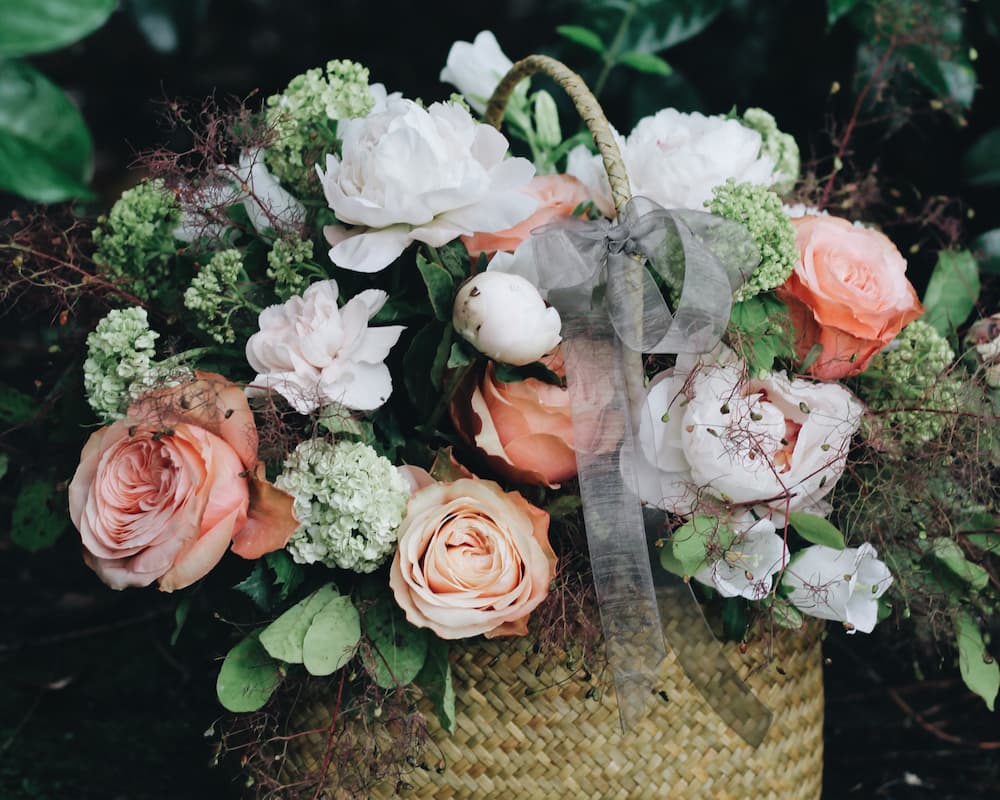 Florist creating flower arrangements in our studio workshop